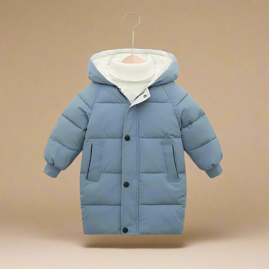 Group of diverse kids playing outdoors, all wearing colorful warm cotton puffer jackets