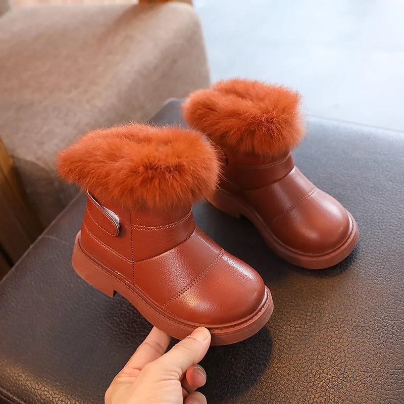 Warm blue snow boots for kids, perfect for keeping feet dry in winter