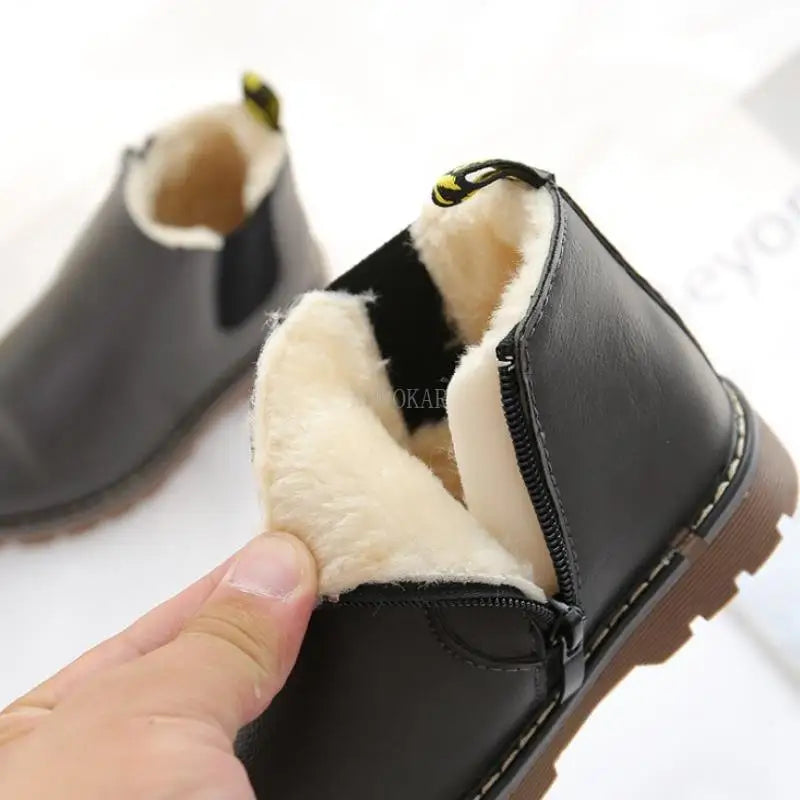 Unisex kids' winter Chelsea boots, blue, waterproof with a convenient side zipper. Ideal footwear.