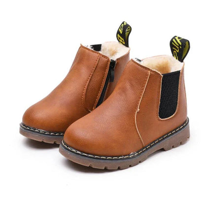 Toddler waterproof boots, pink Chelsea style, durable non-slip sole, side zipper closure.