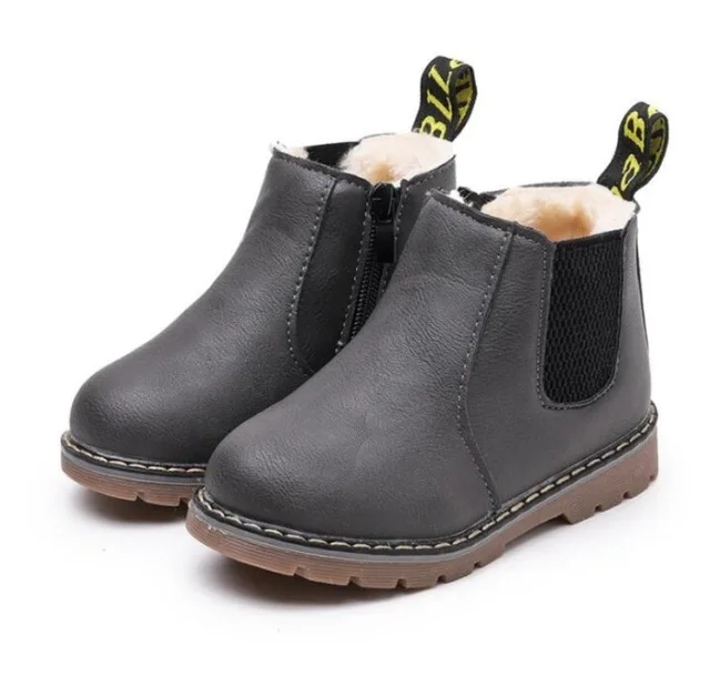 Kids' black waterproof Chelsea boots, side zipper, non-slip, essential footwear for winter play.