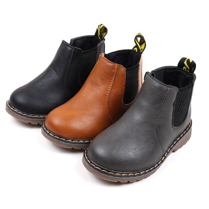 Children's brown waterproof Chelsea boots. Side zipper makes them easy to put on & take off.