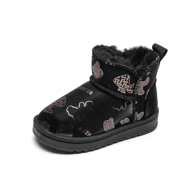 Close-up of waterproof winter snow boots for kids, showing anti-slip sole and warm interior