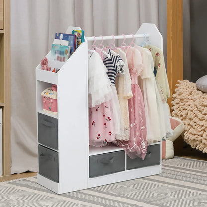 Kids' white wooden dress-up closet with mirror, hanging rail & storage shelves for costumes & accessories.
