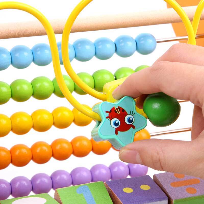 Developmental wooden animal calculator toy, perfect for toddler math and fine motor skills.
