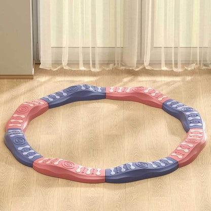 Little girl giggling while walking on a balance beam, fun and engaging coordination toy