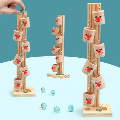 Vibrant wooden clown ball track game for children, featuring a smiling clown and multi-colored balls