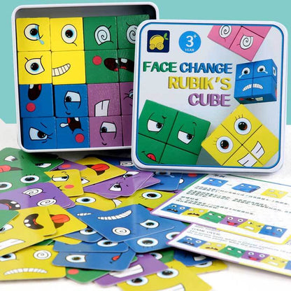 Close-up of a child playing with a colorful wooden face matching cube puzzle