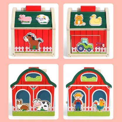Close-up of wooden farm sorting barn toy, showing detailed animal figures and shape slots