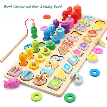 Close-up of magnetic numbers and letters on wooden fish, part of an educational fishing game for kids