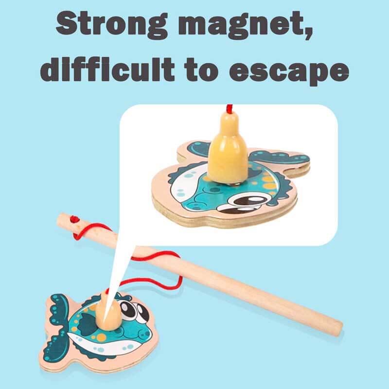 Top-down view of a wooden magnetic fishing game laid out, showing various sea creatures and two poles, activity toy