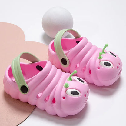 Child's foot wearing purple caterpillar slip-on sandal, ideal lightweight play shoe for kids