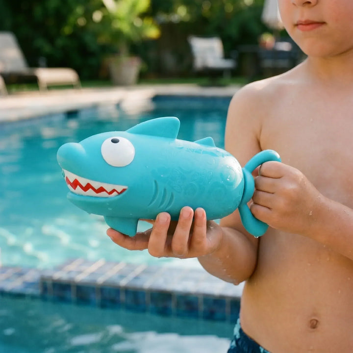 Kids' yellow duck animal water squirter toy for pool, bath, and outdoor summer fun.