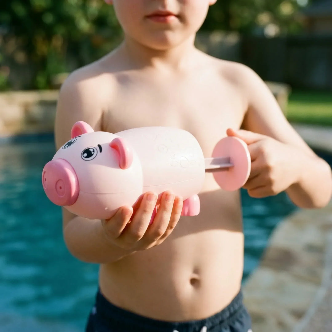 Child squirts water with a cute shark animal water toy; ideal for summer pool & beach play.