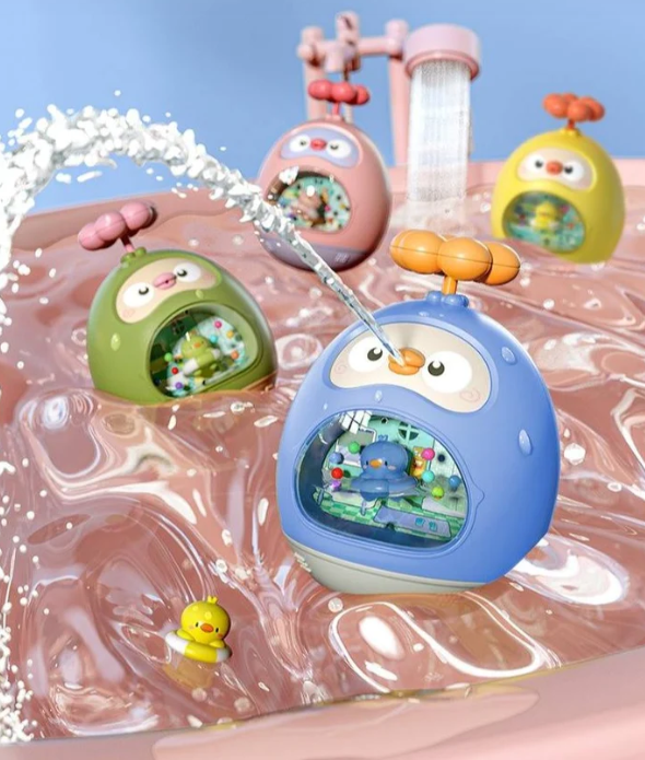 Kids' yellow duck bath sprinkler toy, for fun toddler water play and safe bathing.