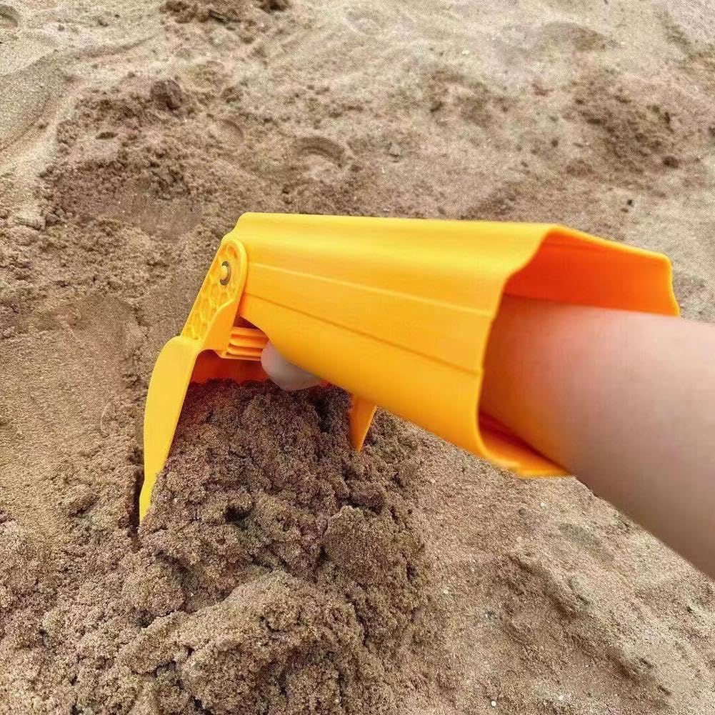 Bright yellow kids' sand digger toy at the beach, encouraging motorskills and fun outdoor play