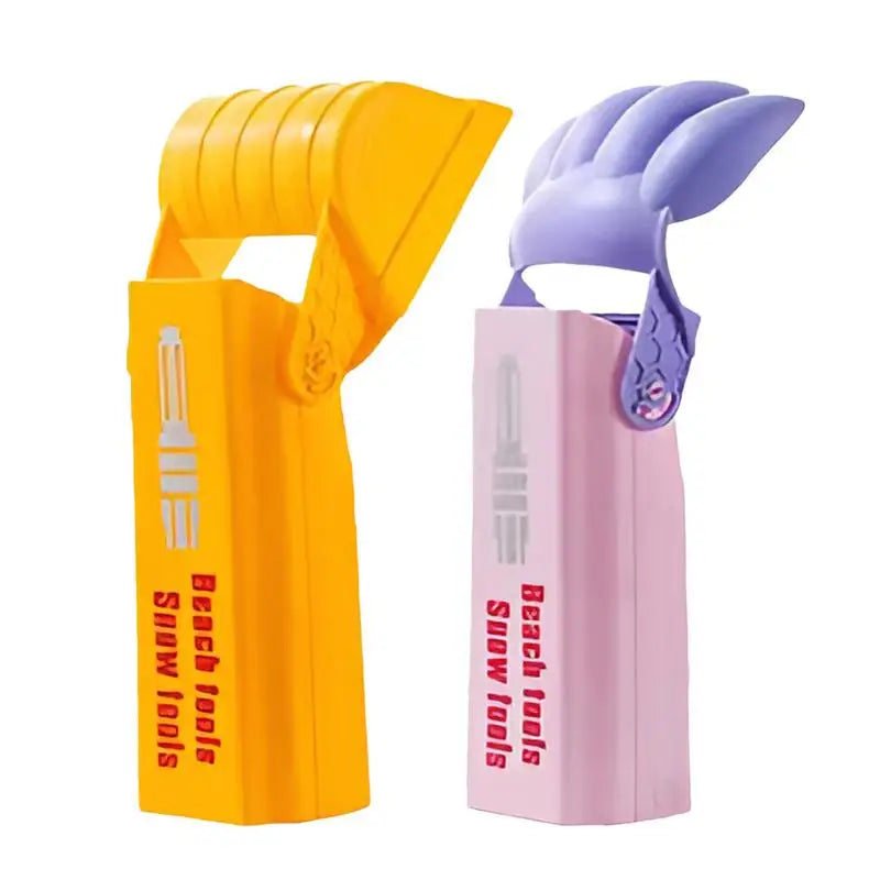 Two children playing with a creative sand digger toy, enhancing motorskills and outdoor fun