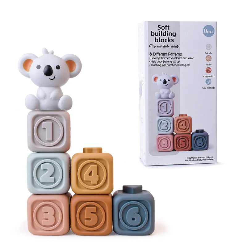 Close-up of Koala Cubes baby teether, a stacking toy designed for infant sensory play