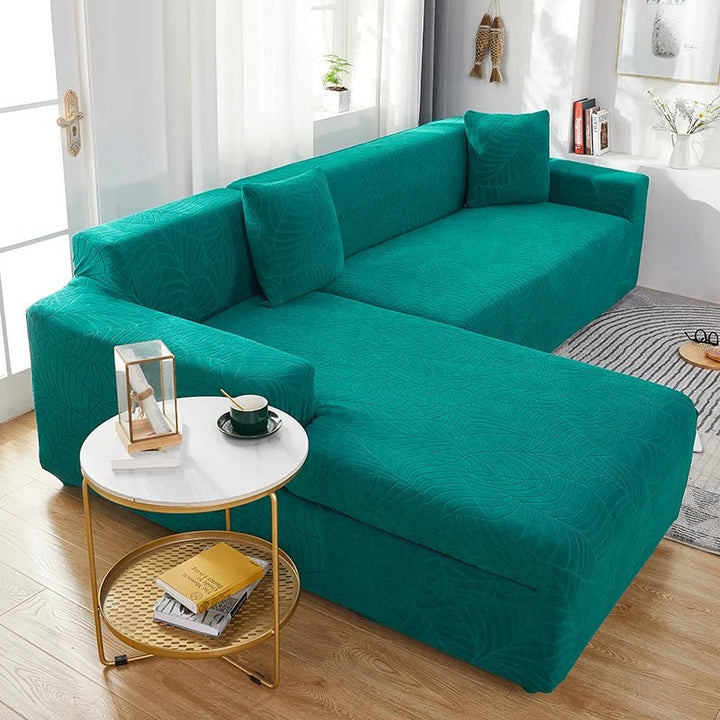 Snug-fit L-shape sofa protector made from elastic polyester, ideal for busy households and pets.