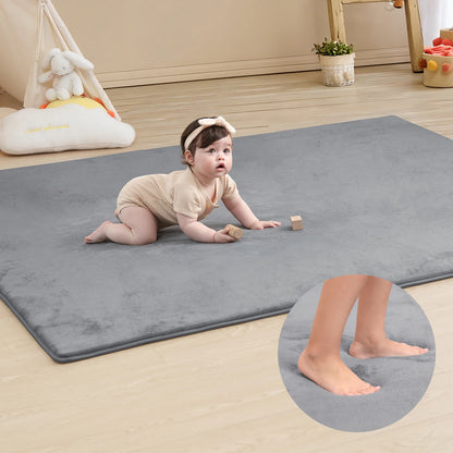 Large memory foam baby play mat, thick and non-slip for safe crawling and tummy time.