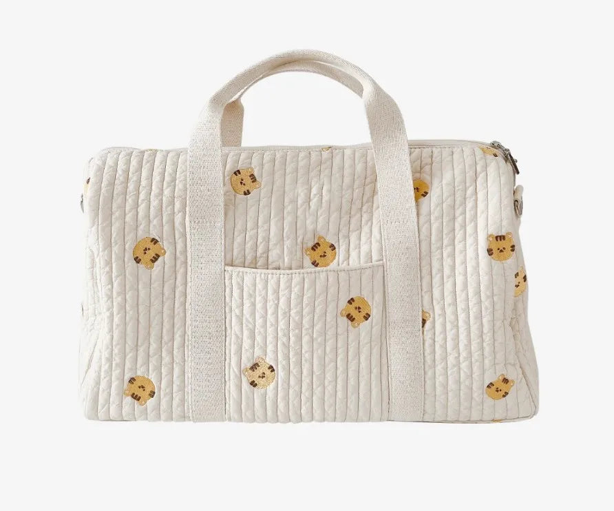 Floral print quilted diaper bag, unisex design, ideal baby accessory