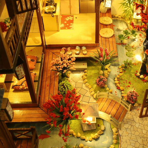 Detailed wooden miniature house kit, a realistic DIY model for architectural enthusiasts with LED lighting.