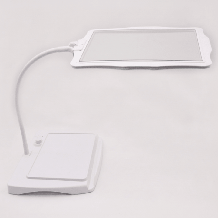 Rechargeable LED magnifying desk lamp for detailed work. Provides bright, hands-free light for reading & precision tasks.