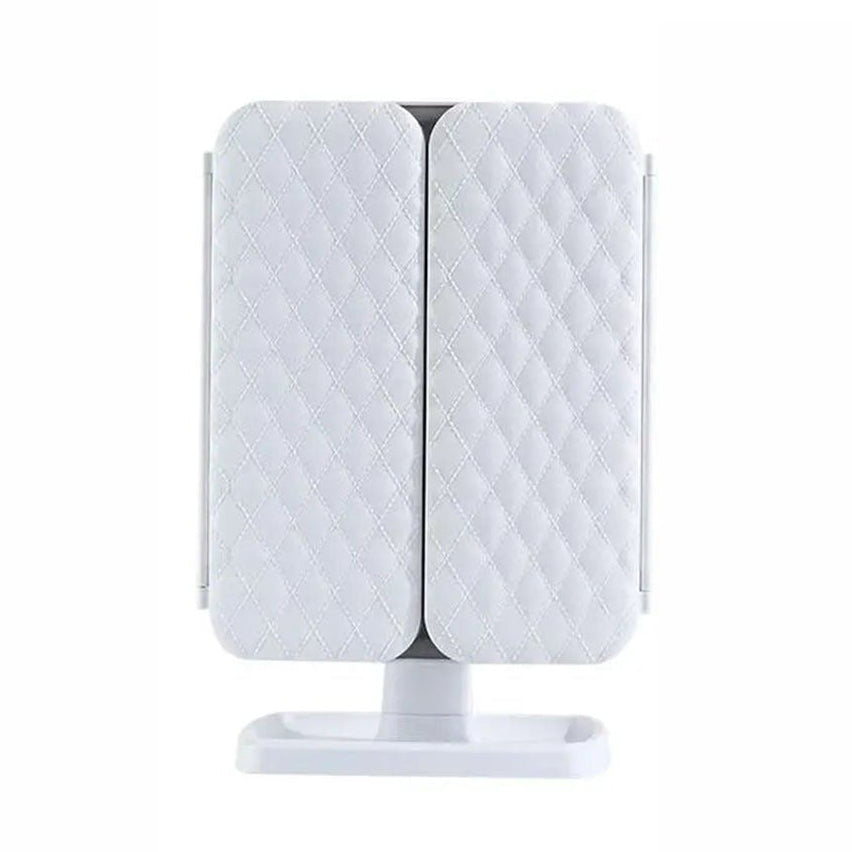 Brightly lit tri-fold LED vanity mirror, showcasing its 3 distinct color light modes for professional makeup.