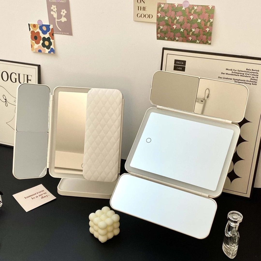 Compact & portable LED tri-fold makeup mirror, featuring 3 light modes for on-the-go beauty perfection.