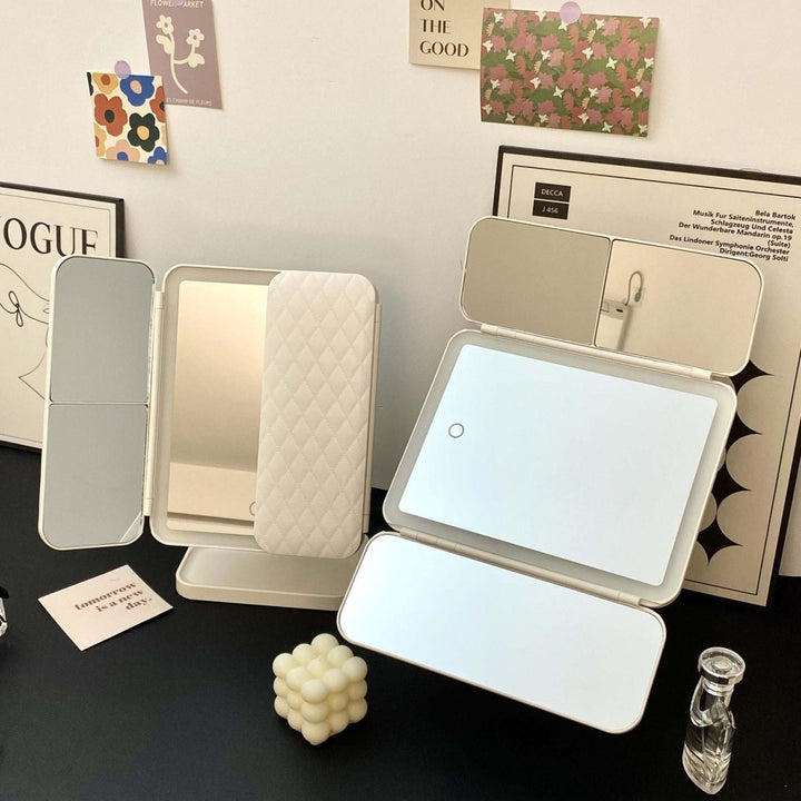 Compact & portable LED tri-fold makeup mirror, featuring 3 light modes for on-the-go beauty perfection.