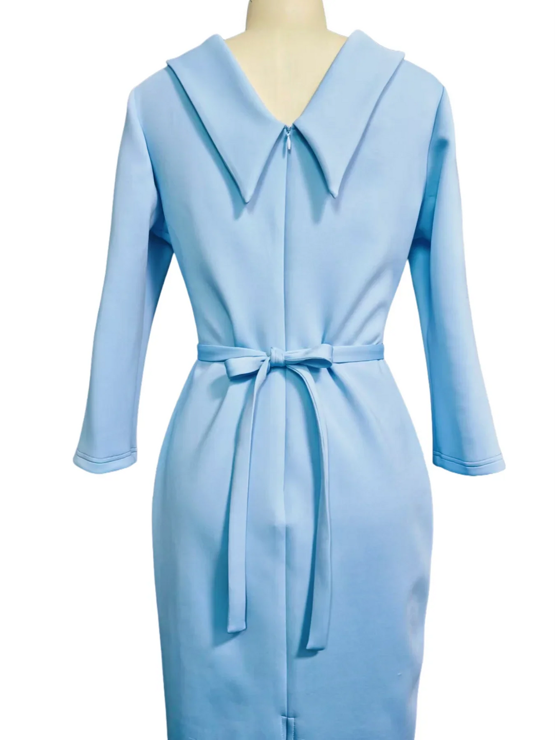 Elegant light blue belted midi work dress for women, featuring a stylish turn-down collar & V-back design.