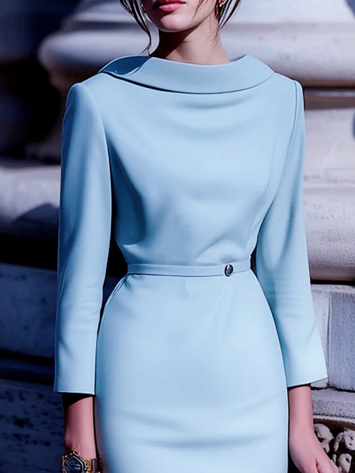 Versatile light blue midi dress with belt, turn-down collar & V-back, suitable for work or casual wear.