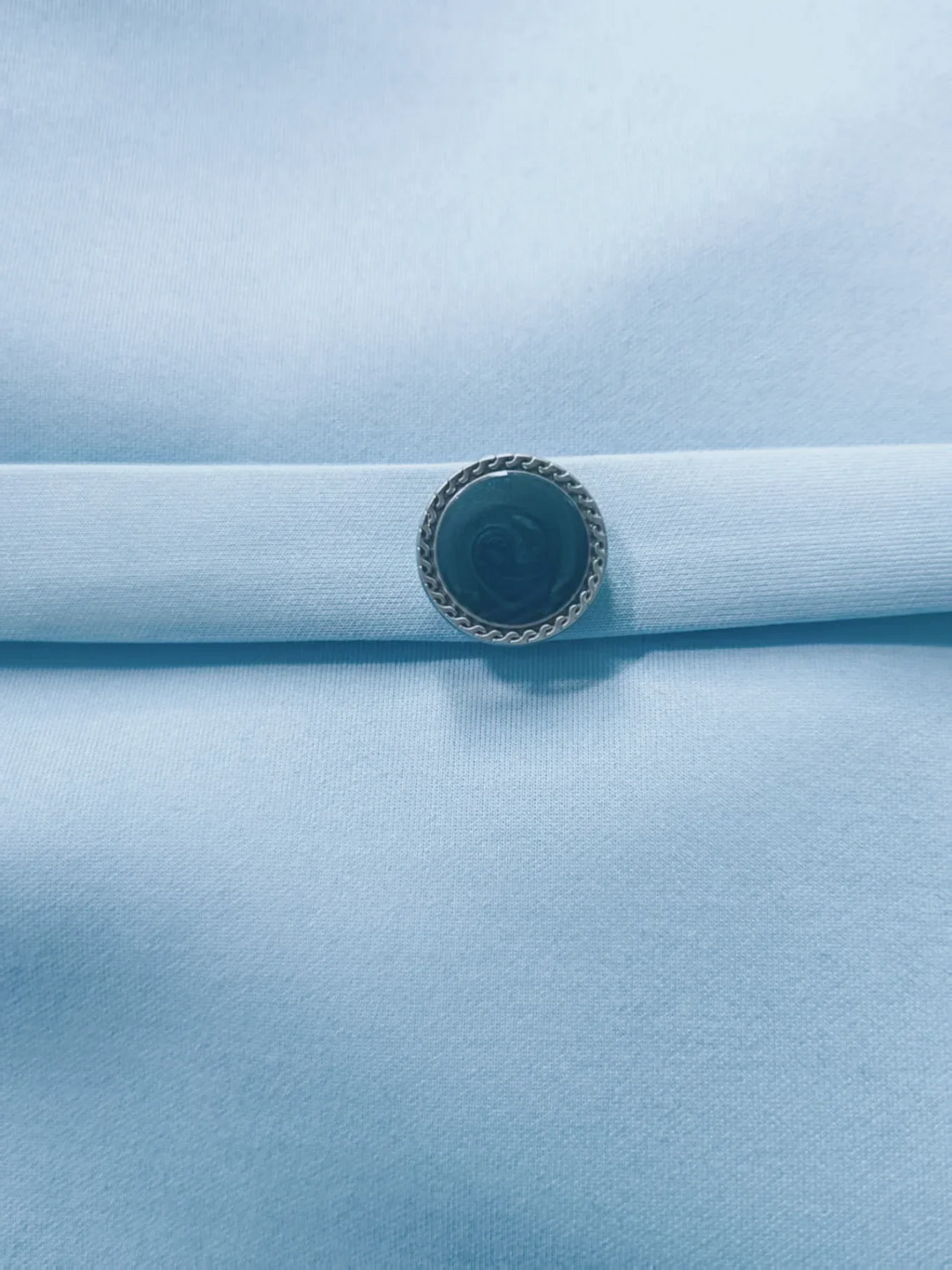 Stylish women's light blue belted midi dress, featuring a sophisticated turn-down collar & elegant V-back.
