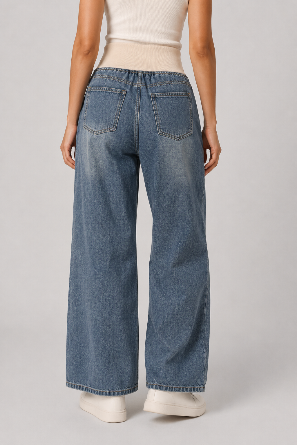 Effortlessly stylish women's light blue loose fit wide leg jeans, a must-have for trendy and comfortable casual outfits.