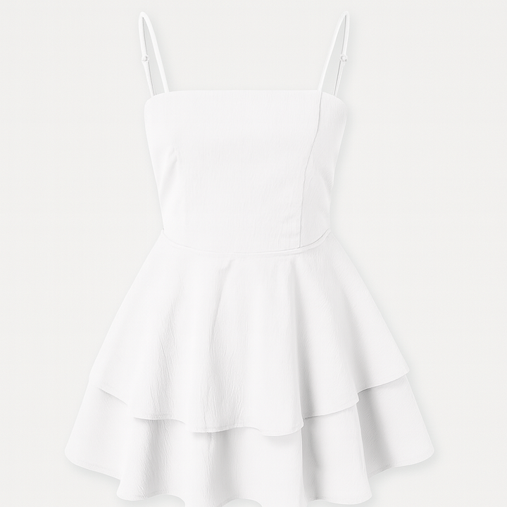 Black women's party mini dress featuring feminine ruffles and delicate spaghetti straps.
