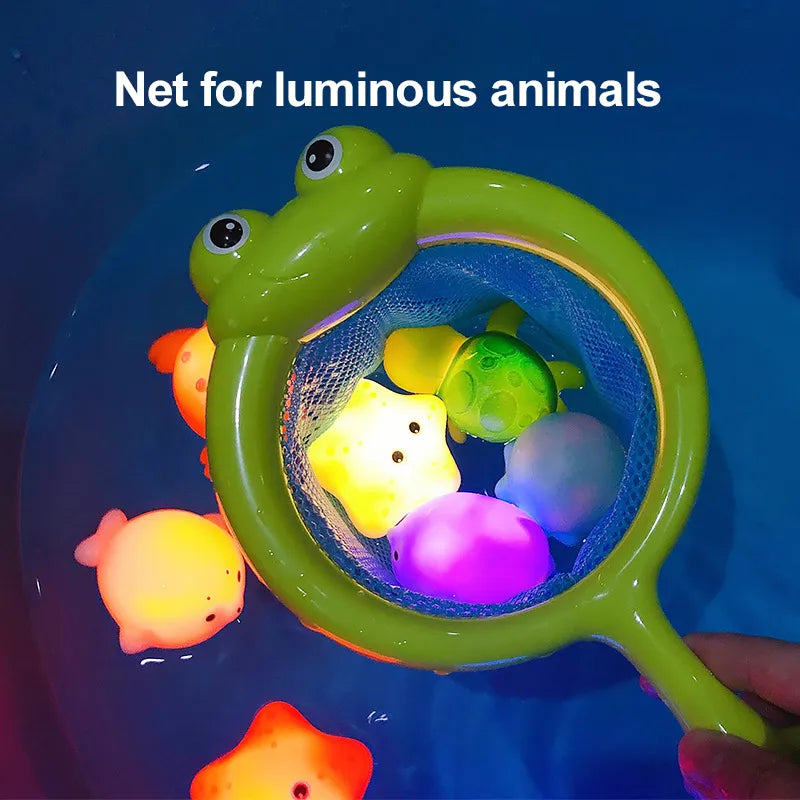Vivid LED bath toys, including a glowing shark, making baby bathing fun