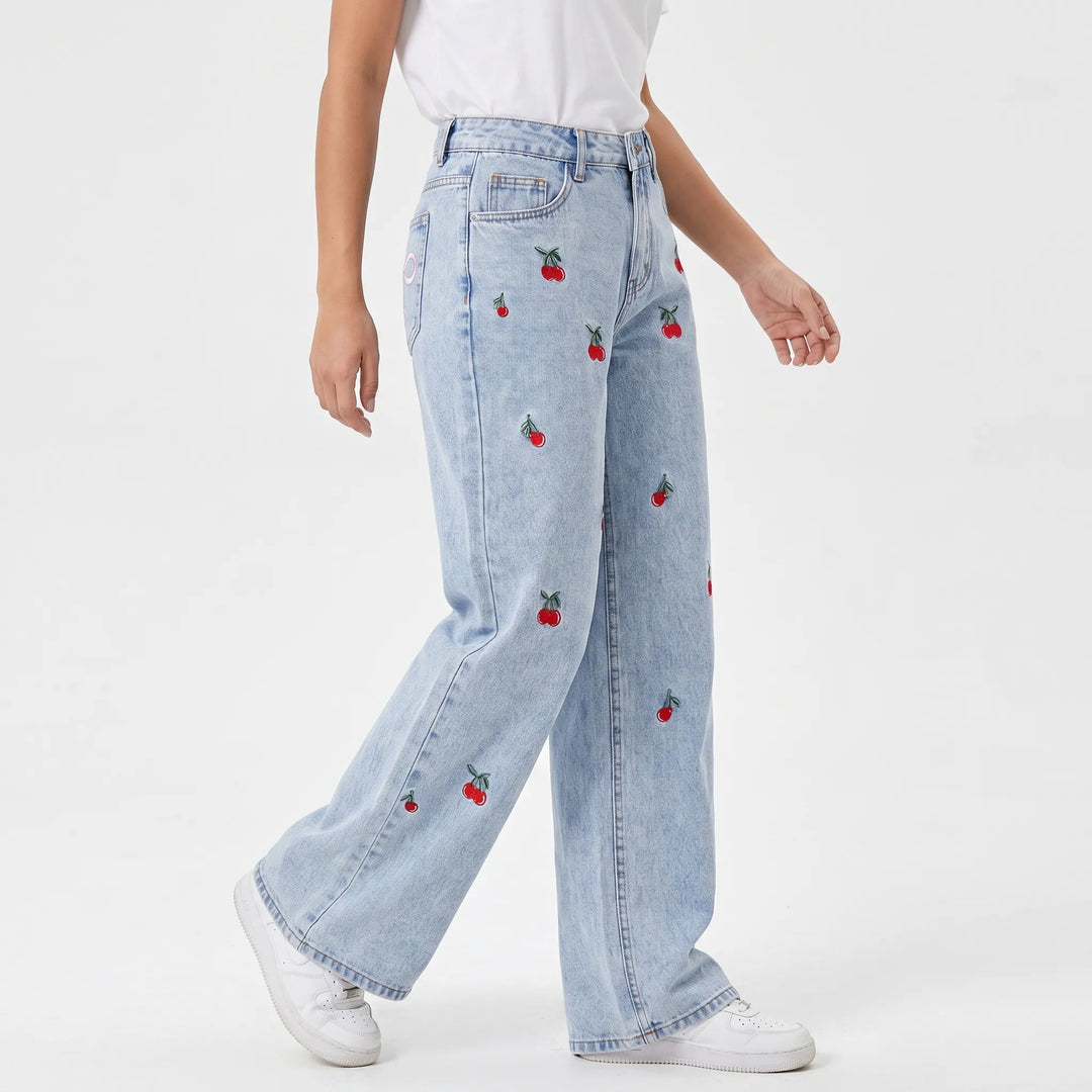 Relaxed fit high-waisted wide-leg denim jeans for women, featuring unique cherry embroidery; ideal for summer casual wear.