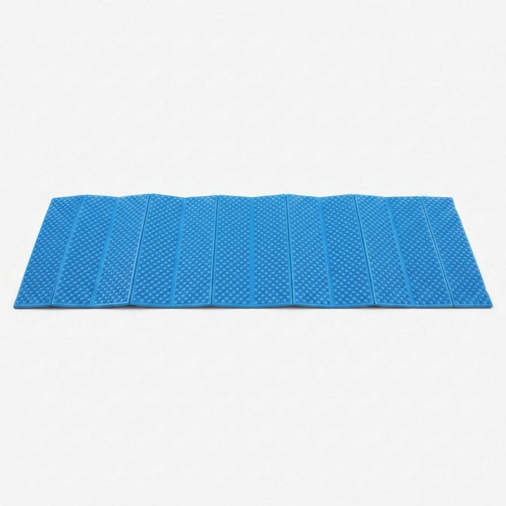 Folded lightweight camping mat, showing its compact size for easy portability. Outdoor sleeping pad.
