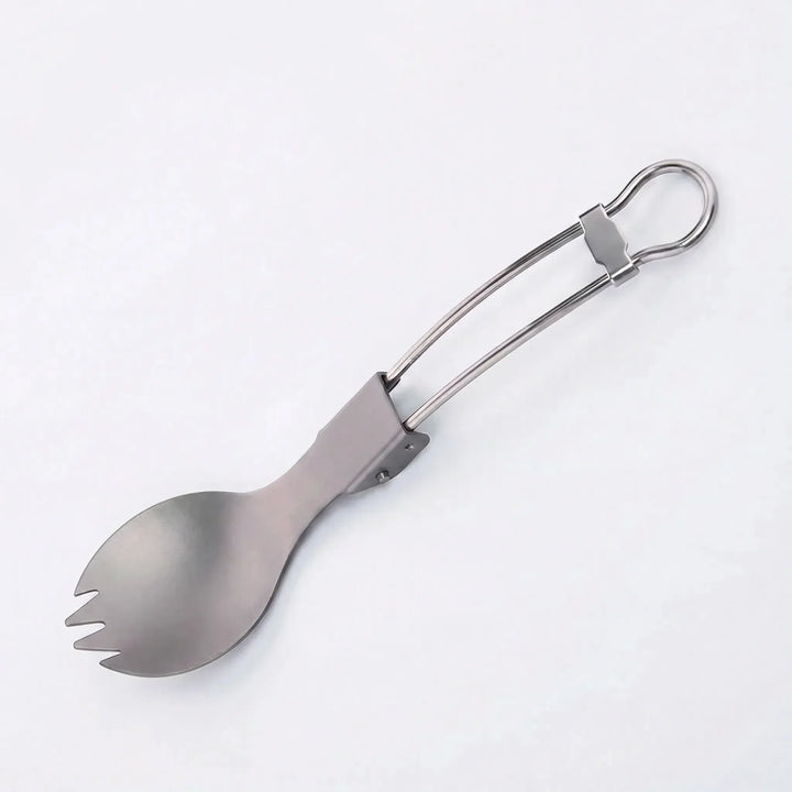 Compact titanium foldable spork, perfect for camp kitchen, hiking gear, and outdoor meals. Essential travel utensil.