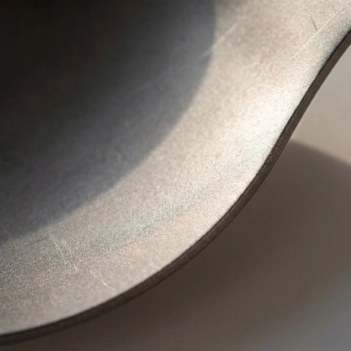 Durable titanium foldable spork, ideal for backpacking, hiking, and camping. Essential lightweight outdoor cutlery.