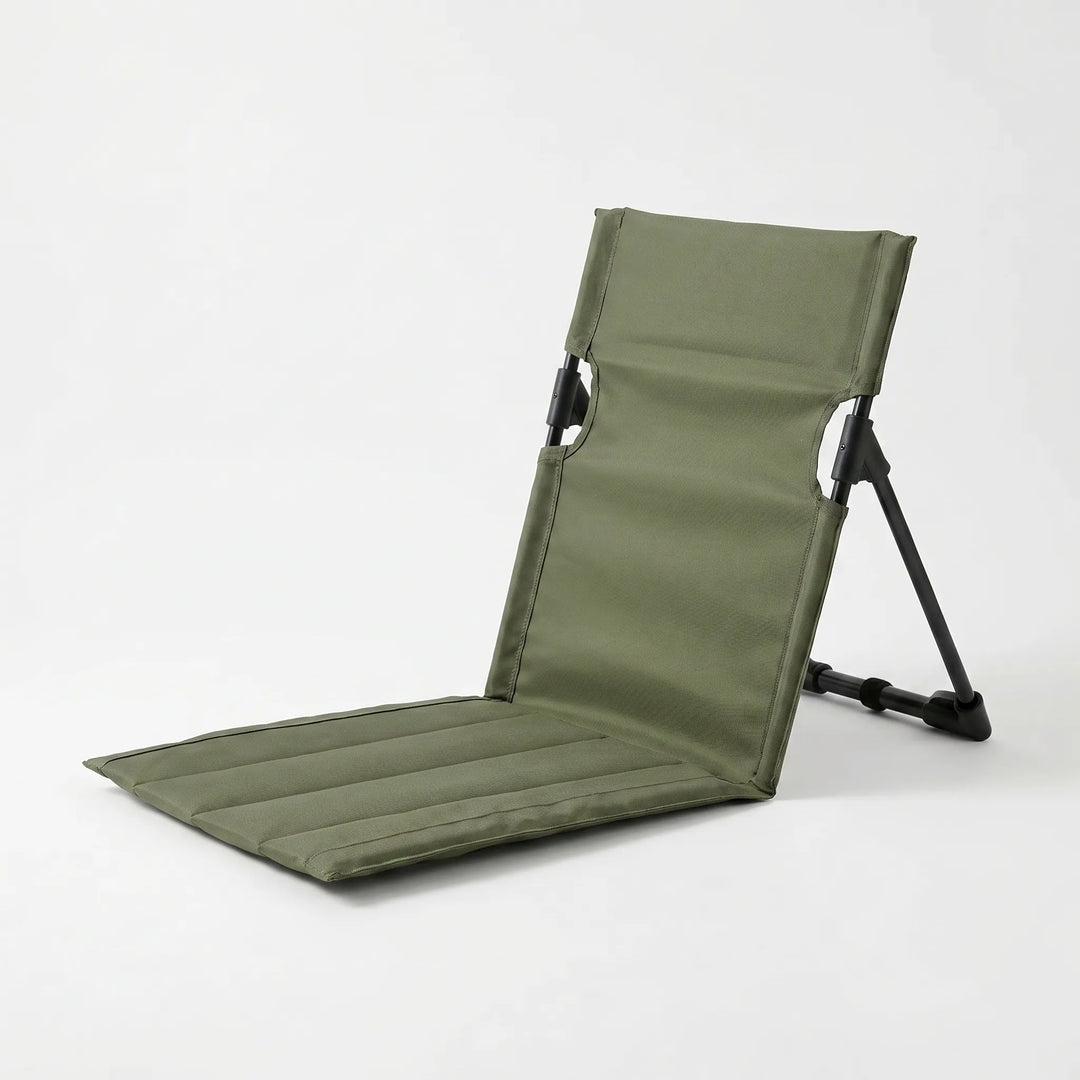Compact folding ground chair with backrest, perfect for beach trips, camping, and comfortable outdoor seating.