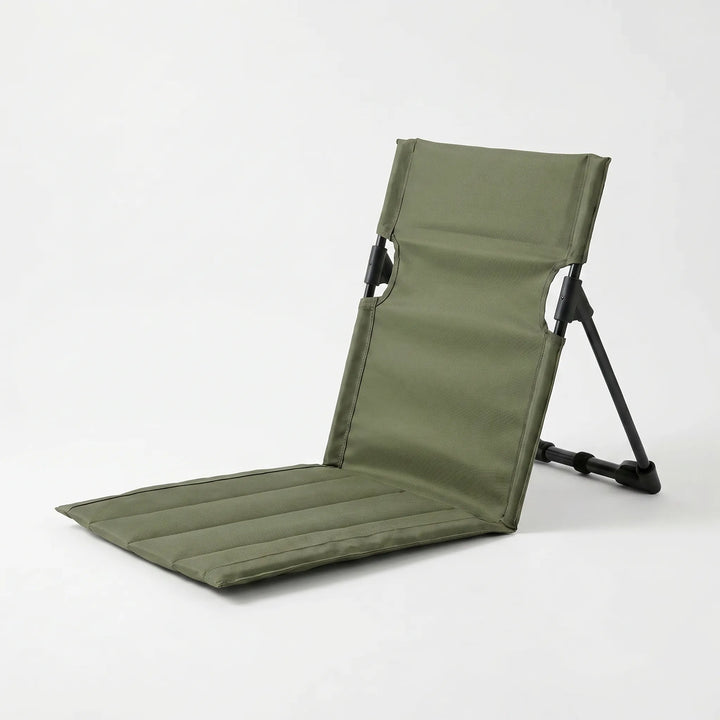 Compact folding ground chair with backrest, perfect for beach trips, camping, and comfortable outdoor seating.