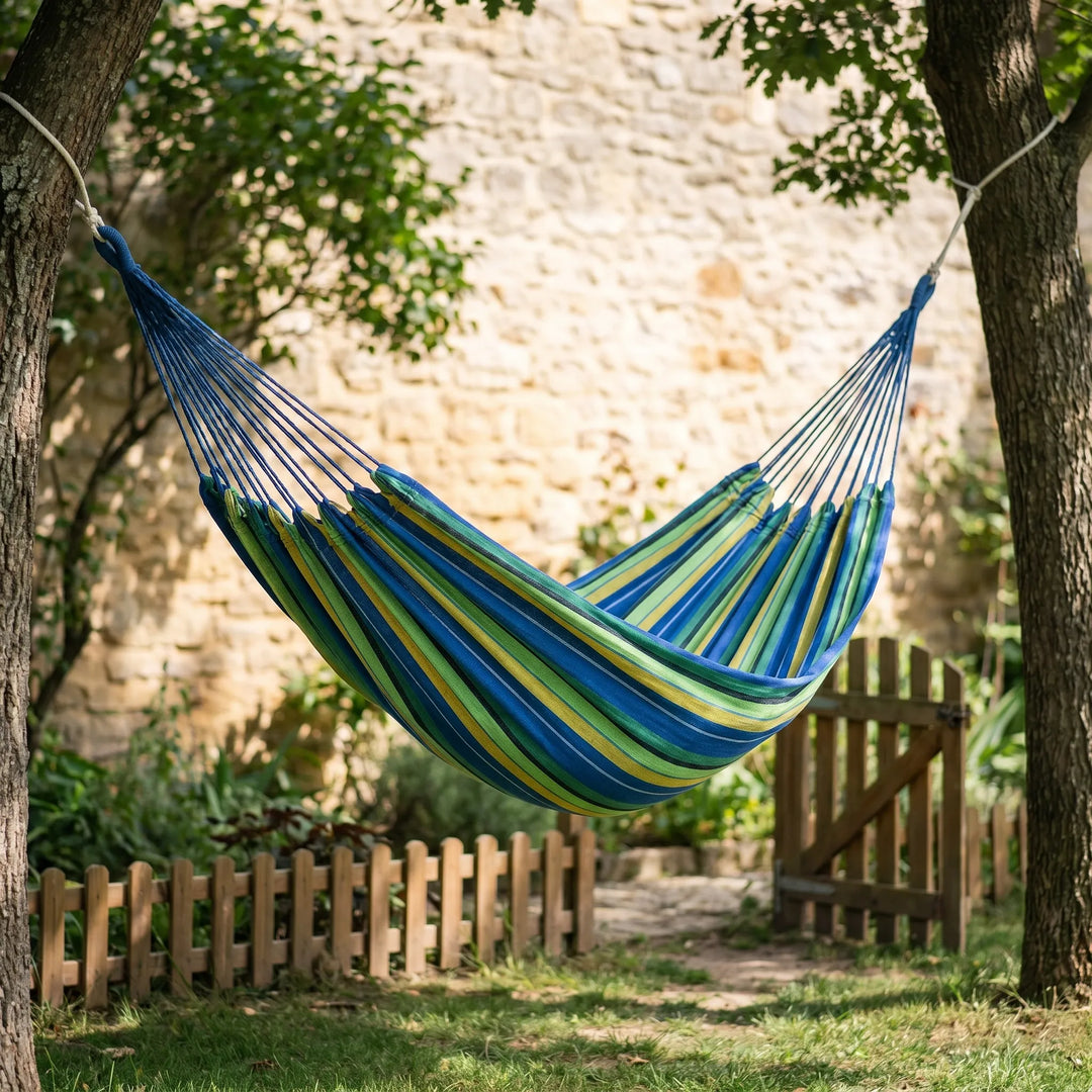 Lightweight portable outdoor hammock, perfect for camping, garden relaxation, or travel. Durable canvas.