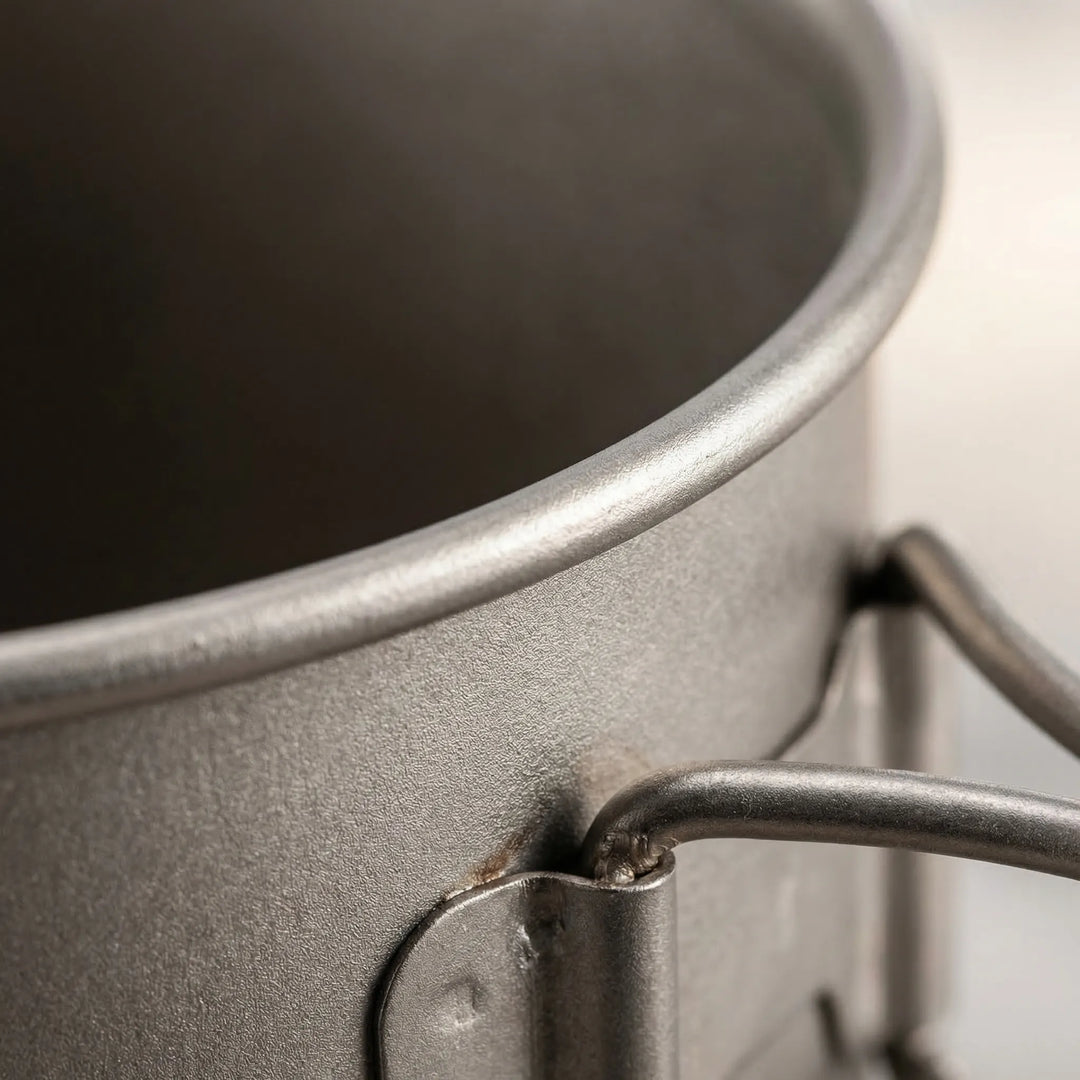 Titanium backpacking cook set with pot, pan & lid. Ultra-light, durable outdoor cooking gear for camp kitchen.