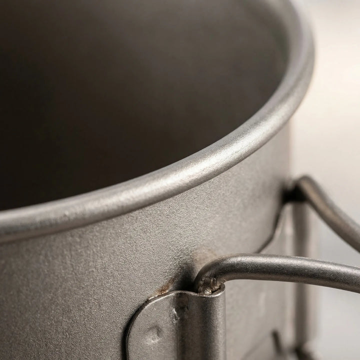 Titanium backpacking cook set with pot, pan & lid. Ultra-light, durable outdoor cooking gear for camp kitchen.