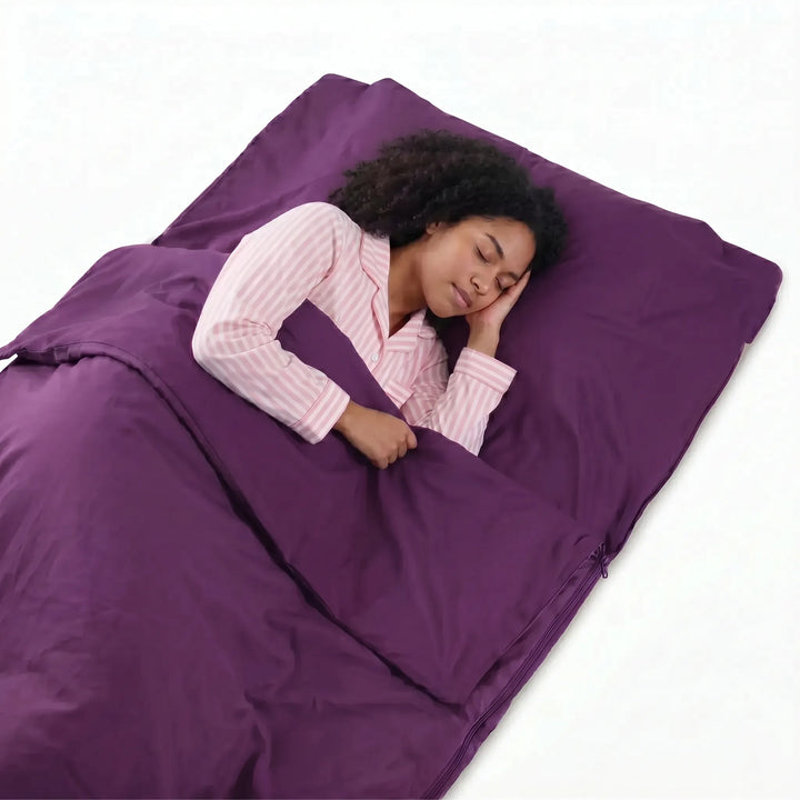 Compact, portable travel sleeping bag liner for camping and hostels. Lightweight design fits easily in backpacks for hygiene.