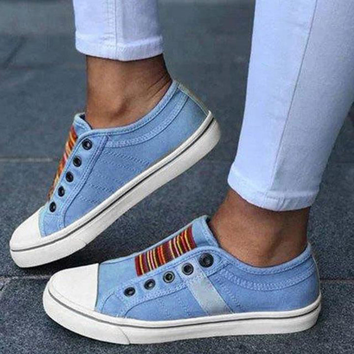 Sporty & versatile women's casual sneakers. Comfortable lace-up trainers, perfect for daily wear & walking.