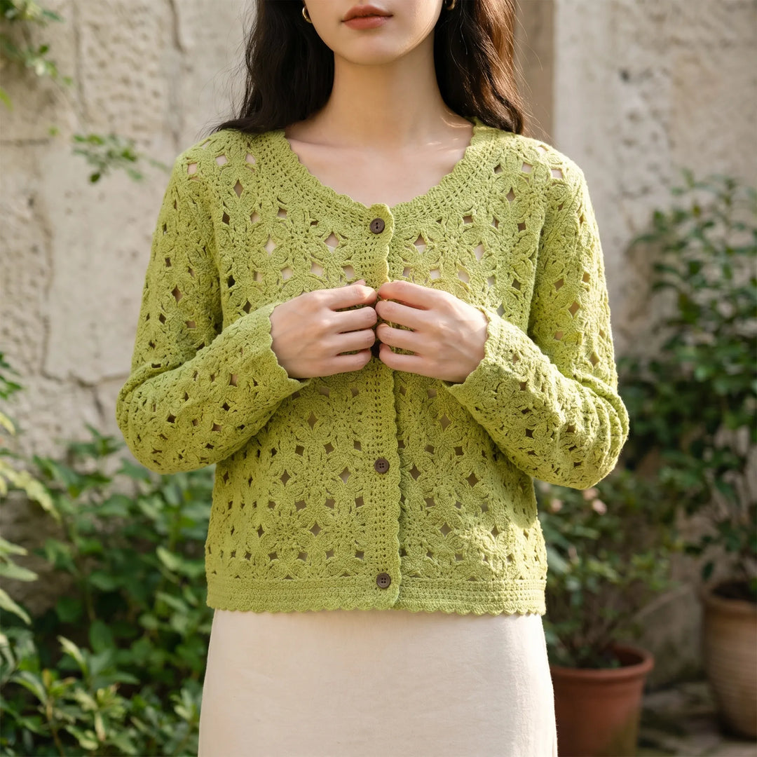 Lightweight women's openwork cardigan in soft green, perfect for summer layering or bohemian style.