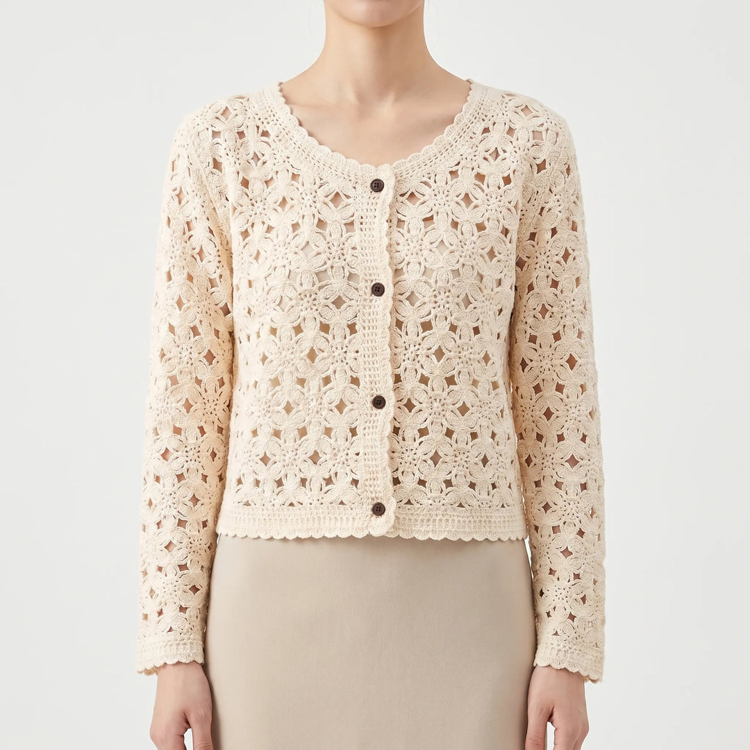 Delicate openwork knit women's cardigan, a lightweight long-sleeve layer for spring/summer fashion.