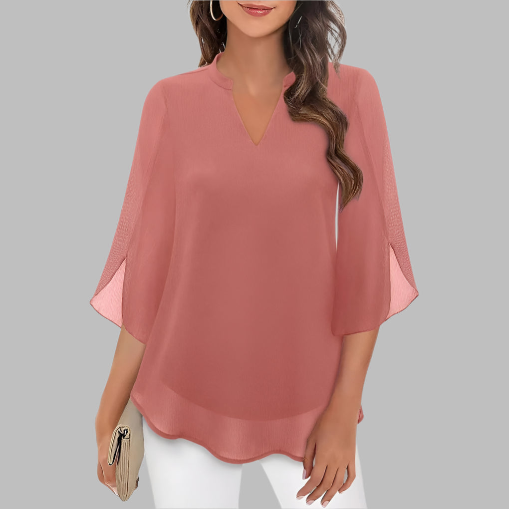 Stylish women's summer top, a V-neck blouse with delicate petal sleeves for a fashionable and comfortable look.